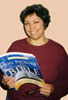 Person holding Big Picture of the Bible book